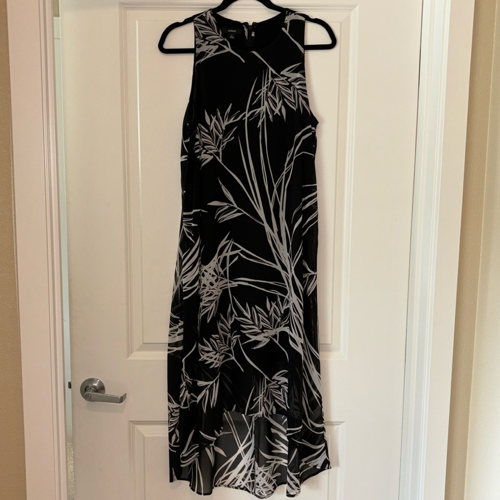 INC sleeveless dress partially lined.  Worn once.